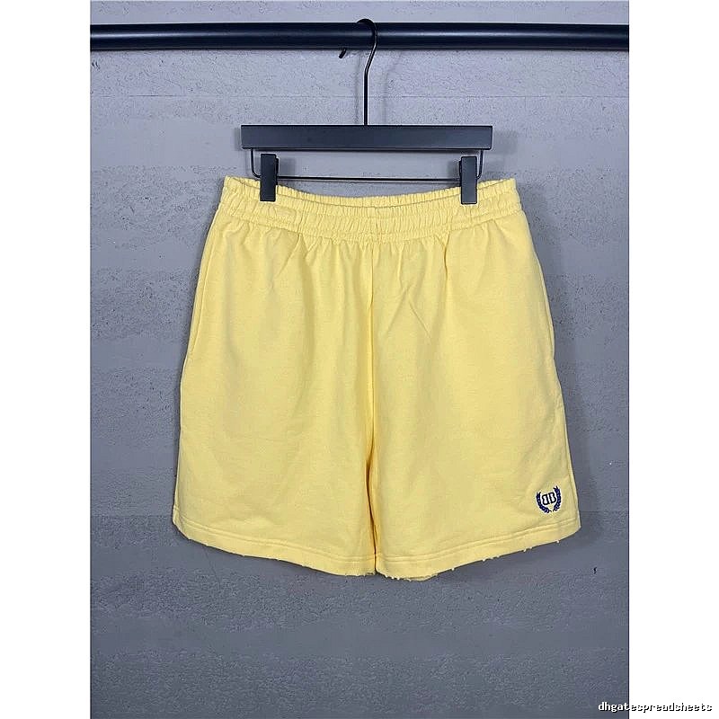 Balenciaga preppy style yellow shorts