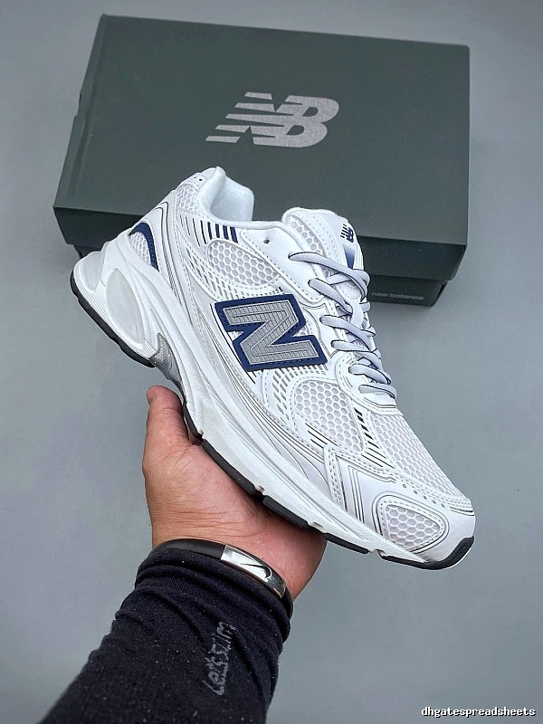 New Balance White and Navy Running Shoes Defined by Classic Running Profile